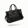Guess Mini Top Handle Bag, black pebbled leather, three-quarter view with gold G GUESS plaque