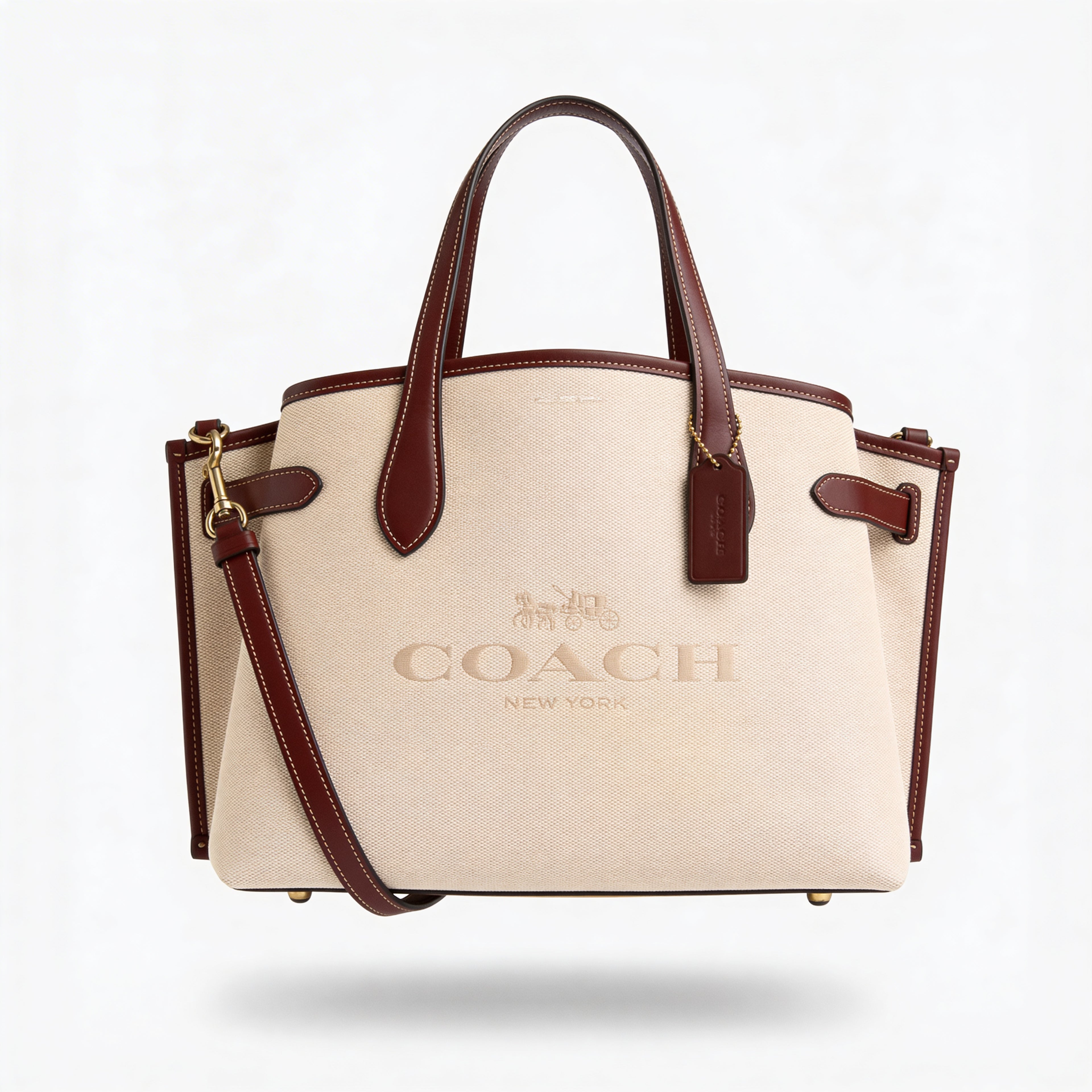 Coach Hanover Tote, detail of horse-and-carriage logo and Coach hangtag