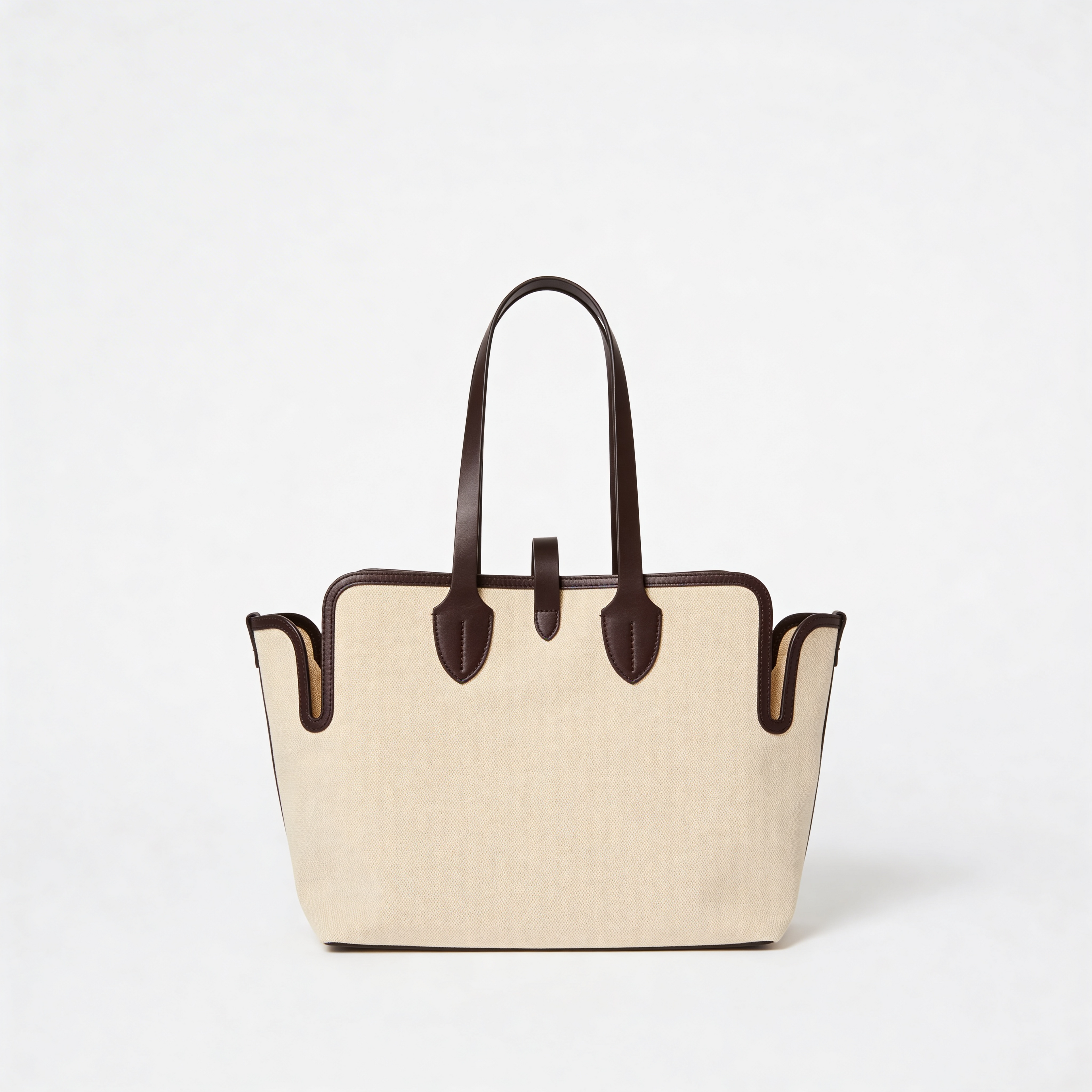 Burberry Society Tote, natural canvas, side angle with black leather handles