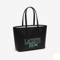 Lacoste Anna Print Tote, black coated canvas with green LACOSTE wordmark and crocodile graphic, front view on pure-white