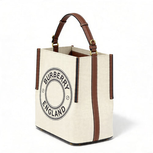 Burberry Logo Graphic Small Canvas Tote, natural canvas with tan leather trim, front 3/4 view with circular Burberry England logo