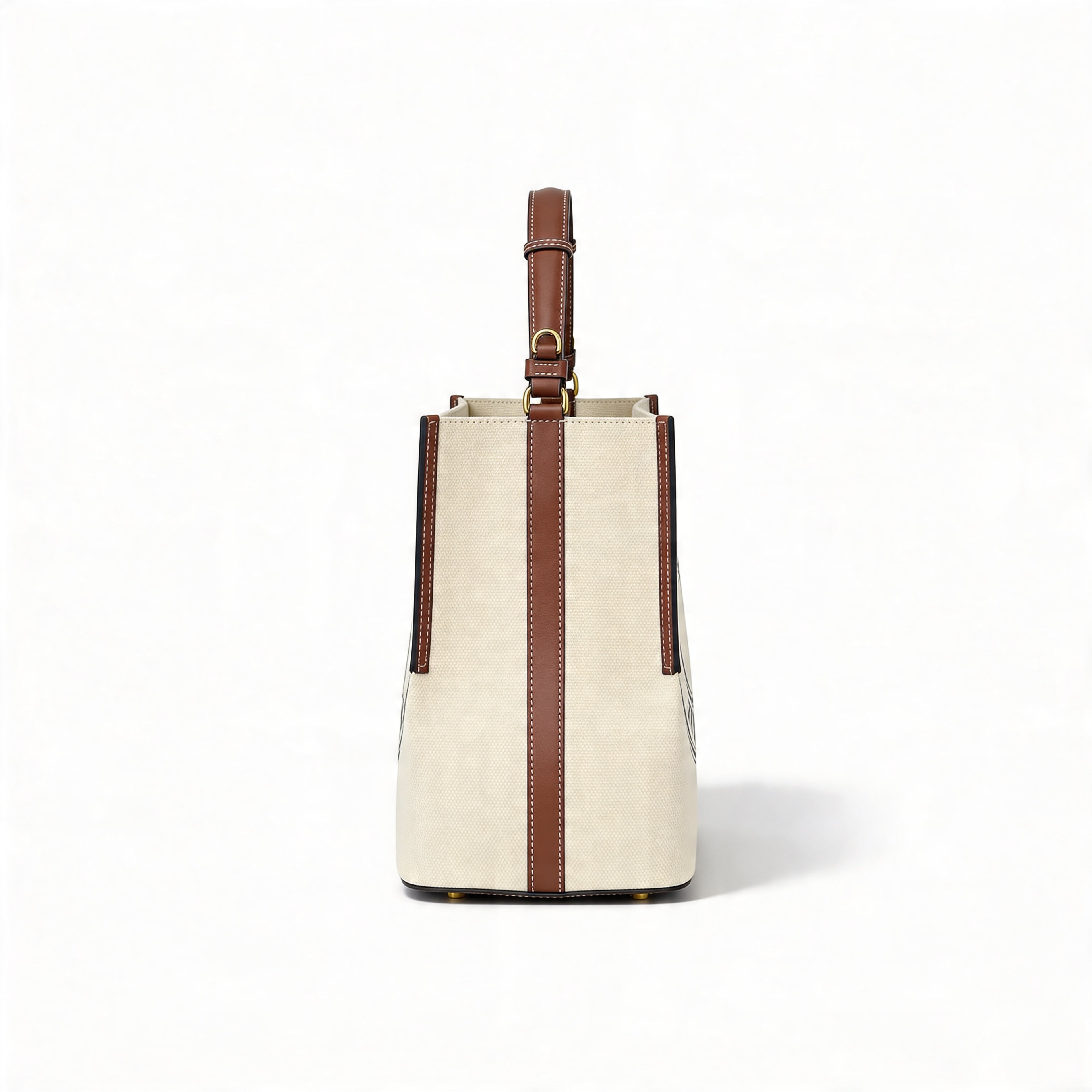 Burberry Logo Graphic Small Canvas Tote, side profile showing vertical tan leather strap and adjustable top handle