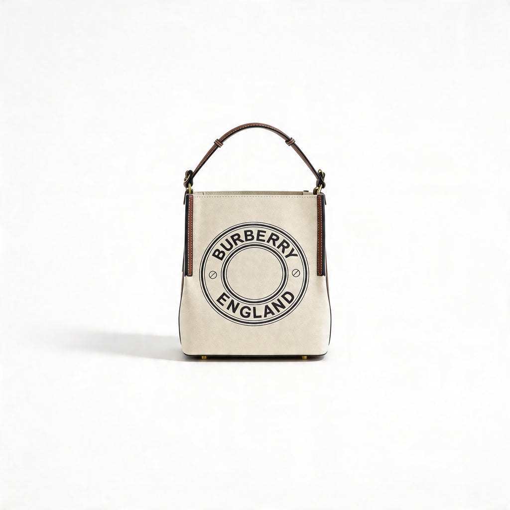 Burberry Logo Graphic Small Canvas Tote, front view with circular Burberry England logo on natural canvas, gold base studs