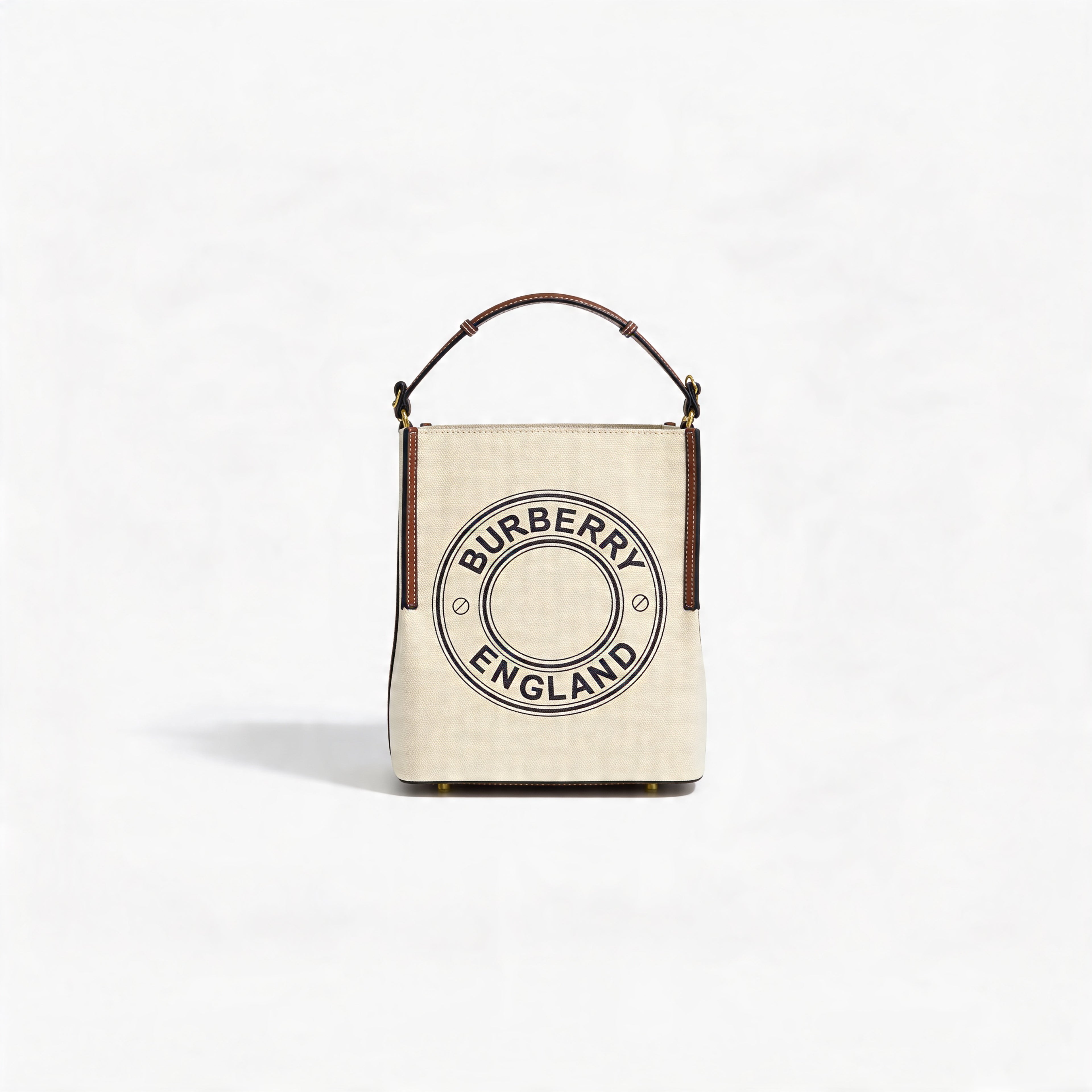 Burberry Logo Graphic Small Canvas Tote, front view on off-white, natural canvas with circular Burberry England logo