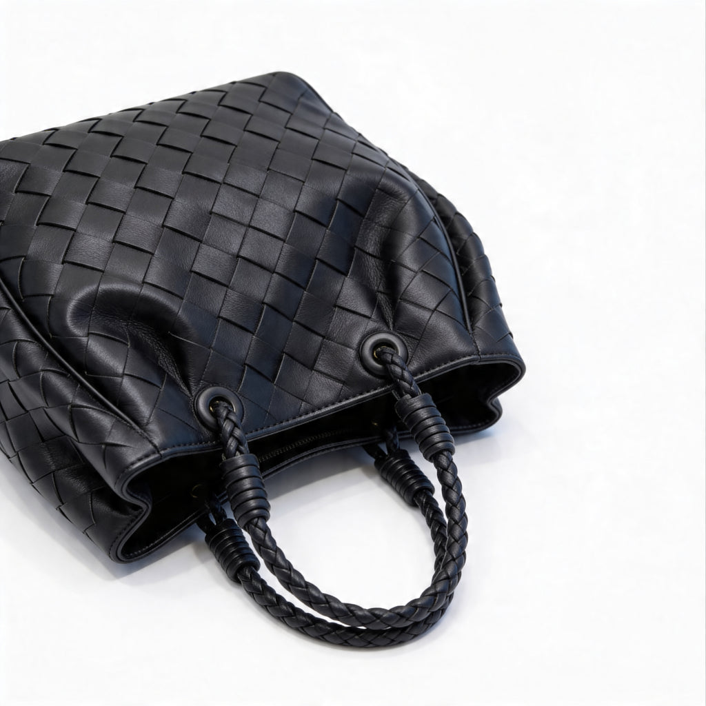 Bottega Veneta Andiamo Mini Tote, top-down view of black intrecciato weave with braided handles