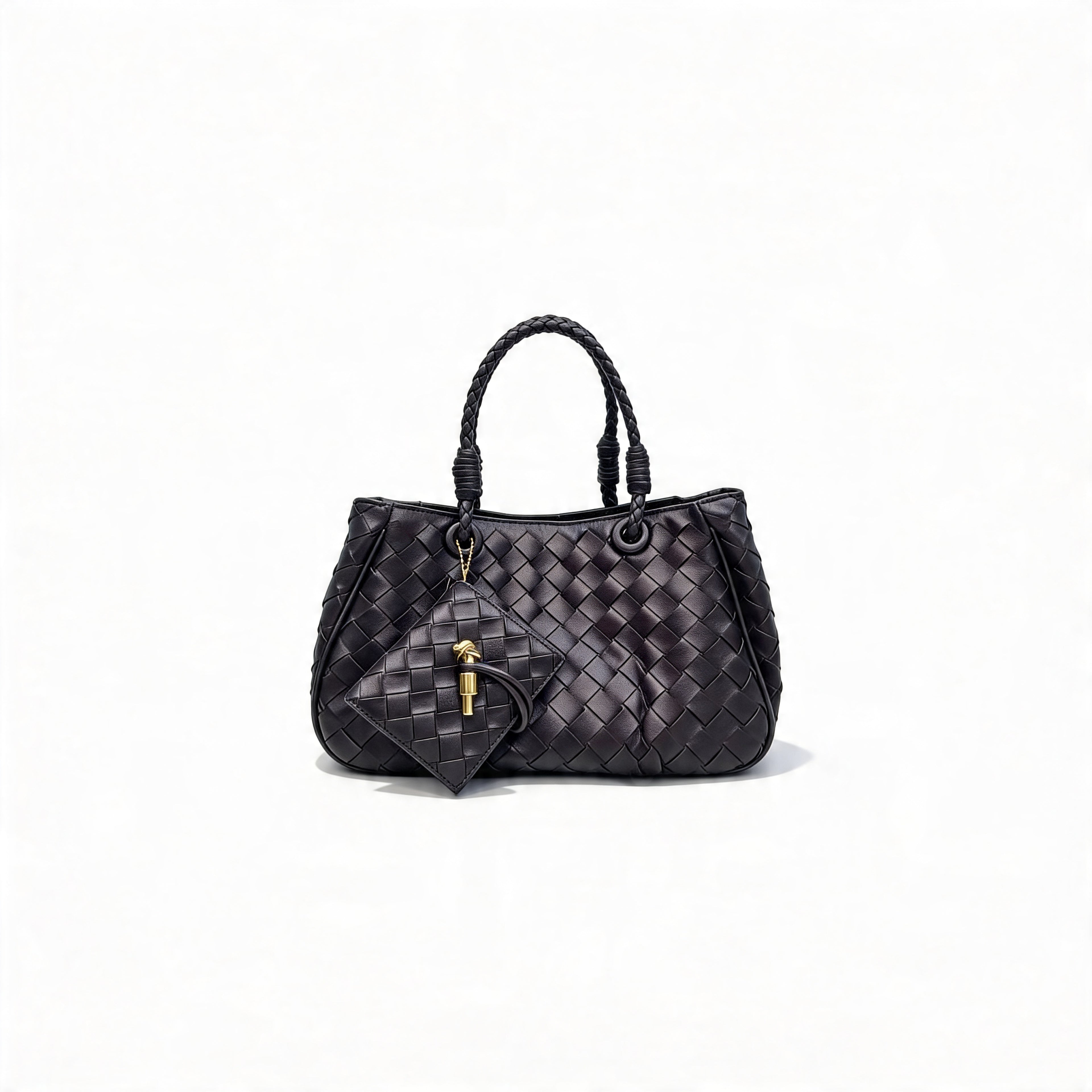 Bottega Veneta Andiamo Mini Tote in black intrecciato leather, front view on white with braided handles and signature charm