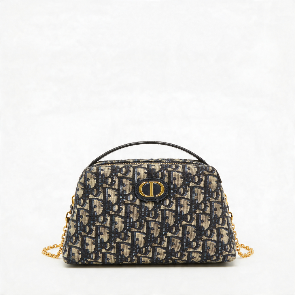 Christian Dior Bobby Bag, navy Oblique canvas, centered front view, CD turnlock and double zip, off-white background
