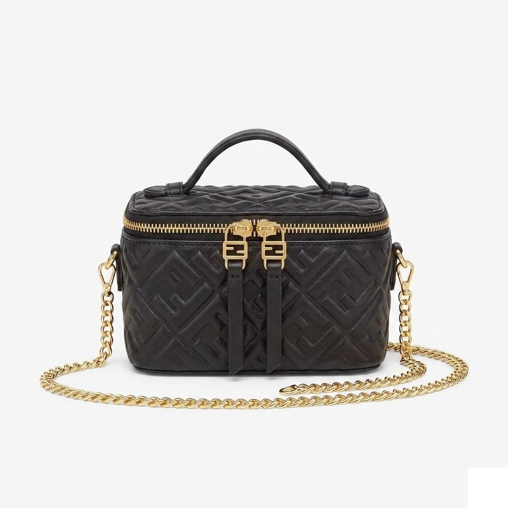 Fendi Mini Vanity Case, black FF embossed nappa leather, gold chain laid out, front view on pure-white