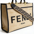 Fendi Sunshine Shopper Tote, natural raffia with embroidered FENDI ROMA, black leather trim and gold FF logo plates, 3/4 close-up