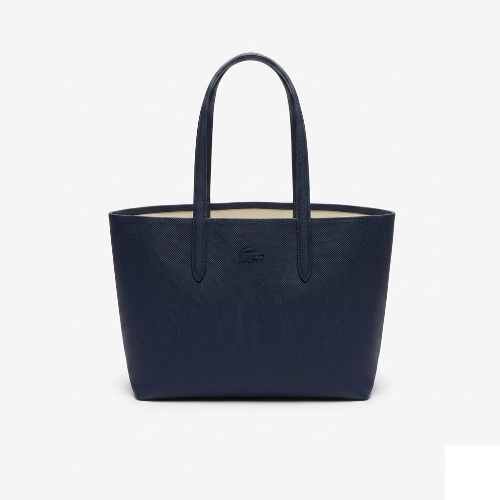 Lacoste Anna Reversible Tote, navy coated petit-piqué canvas, front view on pure-white