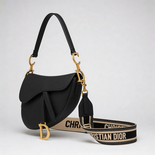 Christian Dior Saddle Bag, black grained leather, gold D charm and embroidered Christian Dior shoulder strap, side angle